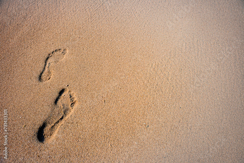 Human footprints in the sand