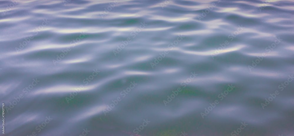 Image of a smooth, naturally moving water surface. Image of a smooth, naturally moving water surface.