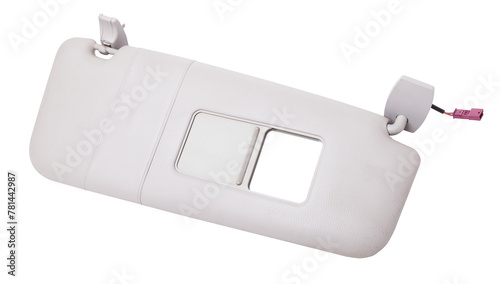 Sun visor with a mirror made of light gray plastic on a white background in a photo studio. Spare part of the car interior for replacement in a car service or for sale on auto dismantling. photo