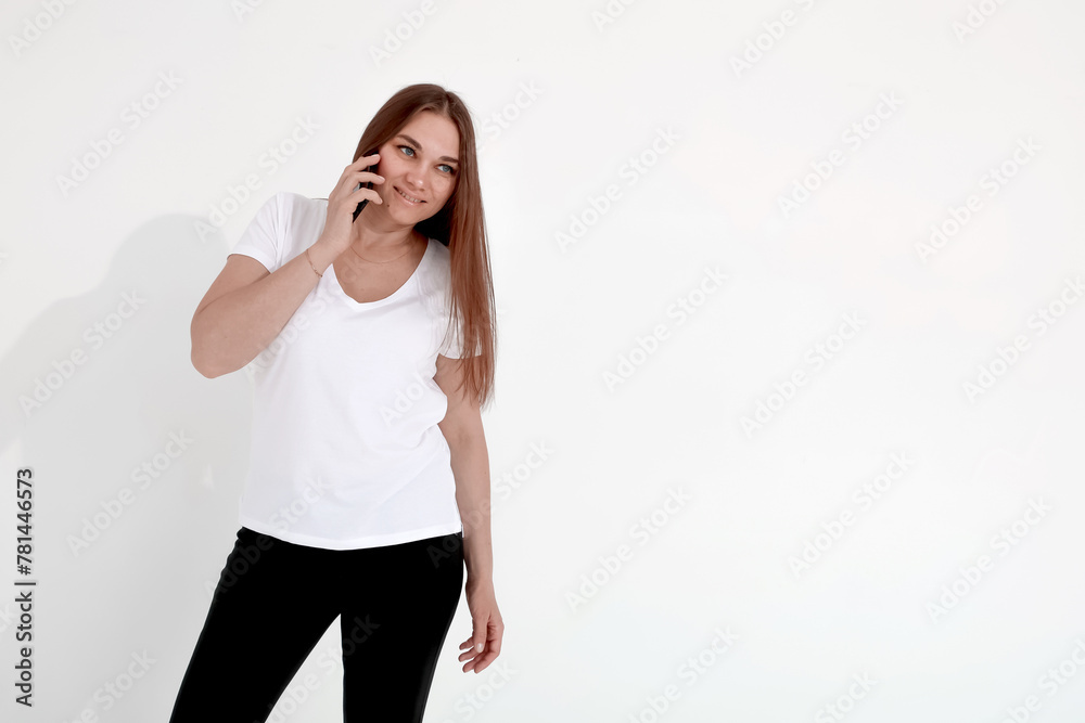 anned girl with a mobile phone on a white background. emotions and gestures. mockup anned girl with a mobile phone on a white background. emotions and gestures. mockup