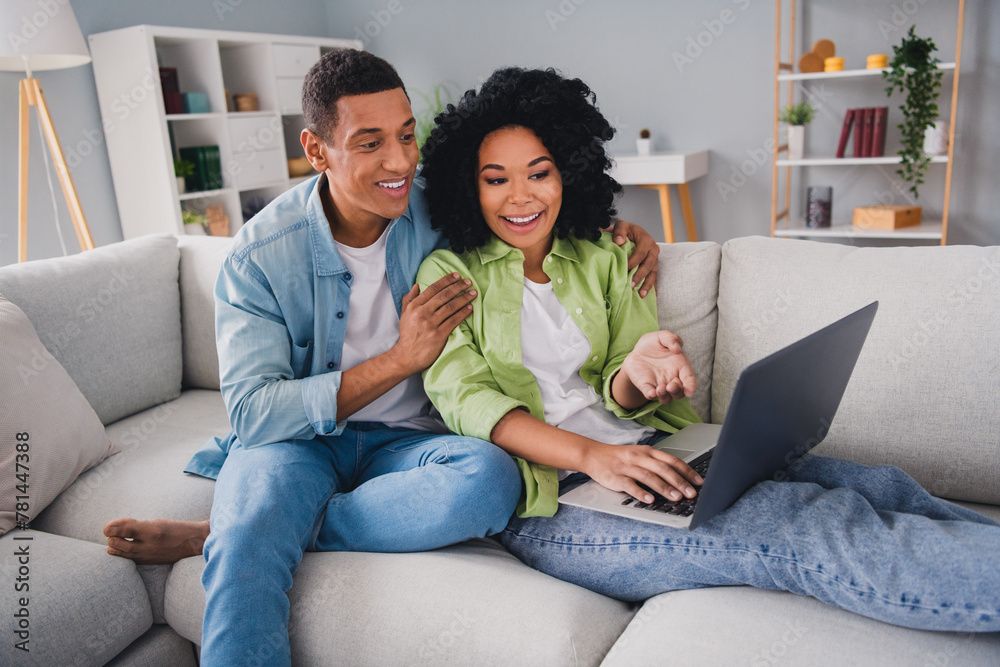 Photo of nice young man girl sit sofa work remotely netbook ecommerce modern interior indoors cozy daylight apartment living room Photo of nice young man girl sit sofa work remotely netbook ecommerce modern interior indoors cozy daylight apartment living room