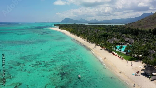 Aerial view of Le morne Brabant in Mauriutius. Tropical crystal ocean with Le Morne mountain and luxury beach in Mauritius. Le Morne beach with palm trees, white sand and luxury resorts, Mauritius. photo