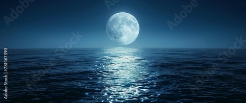 A large moon is reflected in the calm ocean waters