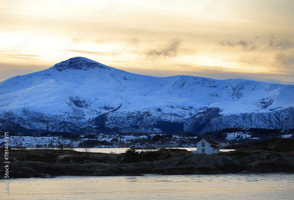 View at the mountains from the Atlantic Ocean Road in winter (Norway).