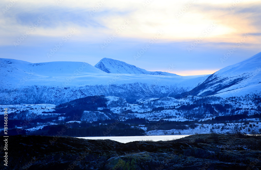 View at the mountains from the Atlantic Ocean Road in winter (Norway).