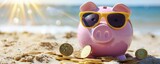 Savings vacation concept - piggy bank on beach