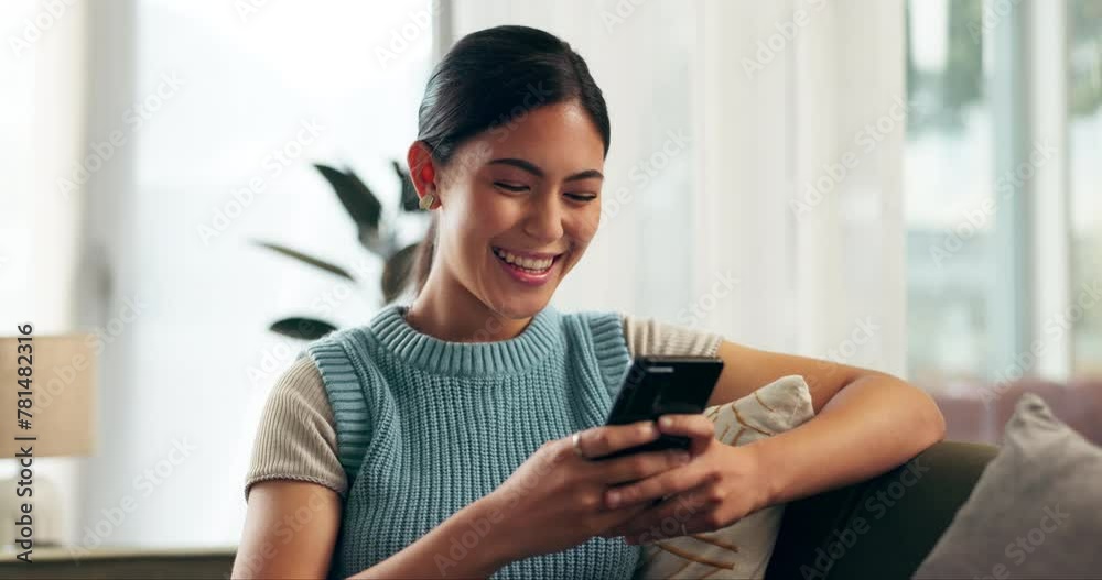 Home, woman and cellphone with typing, smile and online games with digital app and message a contact. Apartment, person on a couch and girl with a smartphone and mobile user with a blog and email