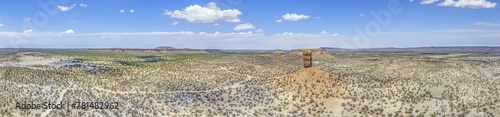 Drone panorama of the landscape around the famous Vingerklip rock needle in northern Namibia during the day photo