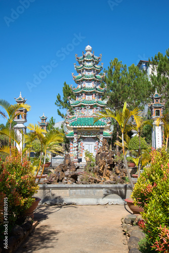 Pagoda in the courtyard of a buddhist monastery Lin Son. Da Lat, Vietnam photo