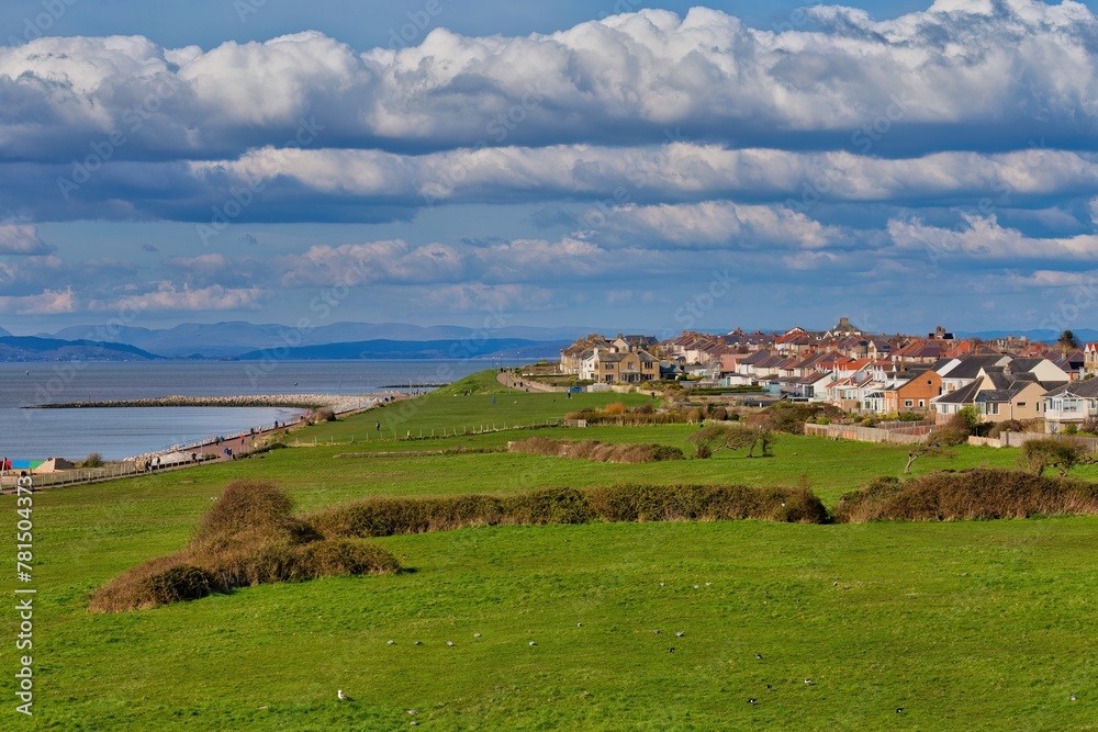View of fields , sea and city of morecambe