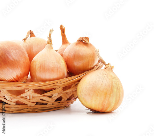 Big ripe onions in a basket.