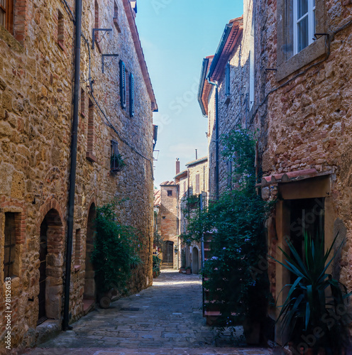 Fototapeta Naklejka Na Ścianę i Meble -  The old narrow streets in the medieval town of Casale Marissimo in Tuscany shot with analogue film technique