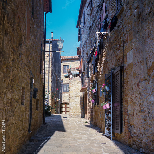 The old narrow streets in the medieval town of Casale Marissimo in Tuscany shot with analogue film technique