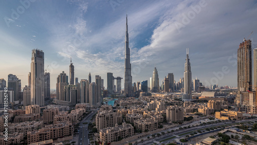 Dubai Downtown skyline day to night timelapse with Burj Khalifa and other towers panoramic view from the top in Dubai