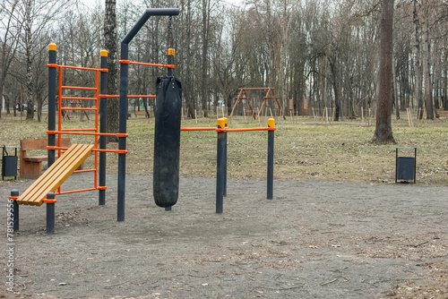 Urban sports ground with weight training and exercise equipment for sports. Sports and recreation area. Empty sports ground outdoor workout in a park.