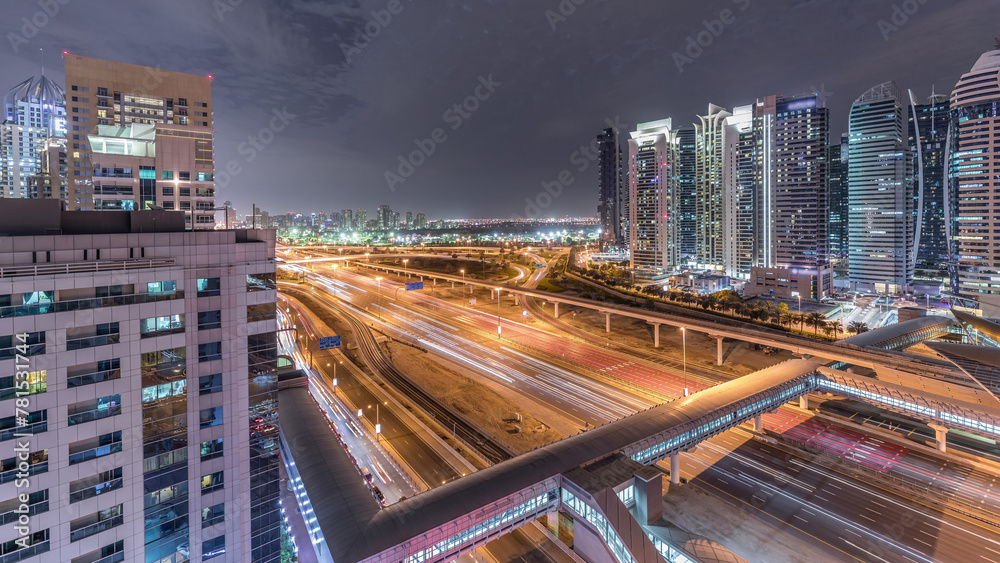 Fototapeta premium Aerial top view to Sheikh Zayed road near Dubai Marina and JLT timelapse, Dubai.