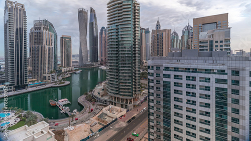 Aerial view of Dubai Marina residential and office skyscrapers with waterfront timelapse © neiezhmakov
