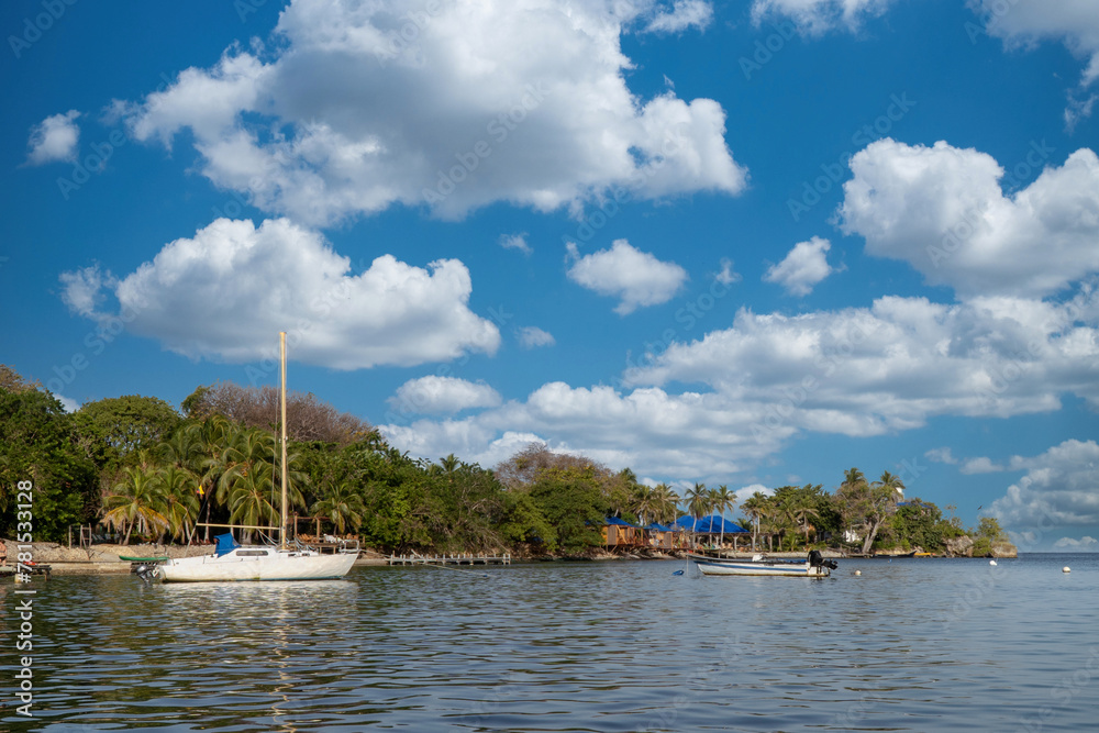 Palma island seen from a boat with sea and blue sky. San Bernardo Colombia. Palma island seen from a boat with sea and blue sky. San Bernardo Colombia.