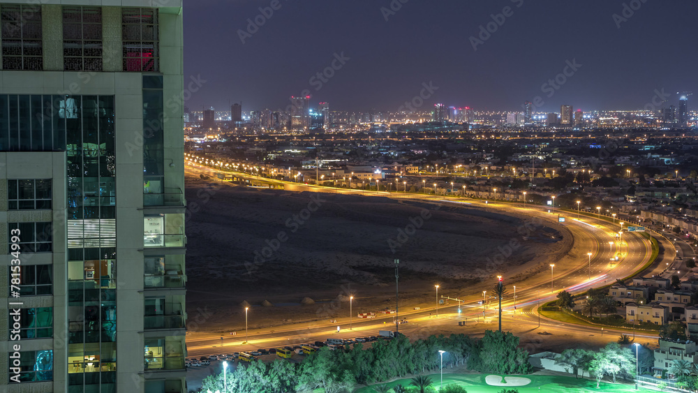 Fototapeta premium Aerial view to villas and houses with Golf course night timelapse