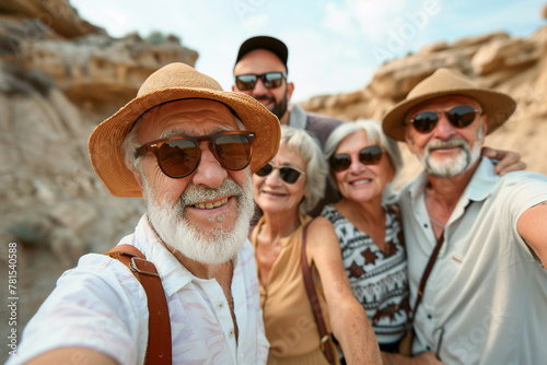 Active aging, happy group of senior people smiling at camera at mountains, old friends taking selfie pictures, Life style concept with pensioners having fun together on summer holiday. AI Generated © Alexandra