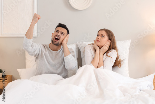 Young couple suffering from...