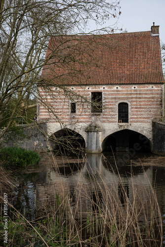 The Spui Groot Spui, former lock house on the Binnennete in Lier Belgium. Historic building landmark part of original town walls for fortification and protection of water level, popular tourist sight  © drew