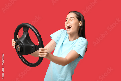Happy young woman with stee...