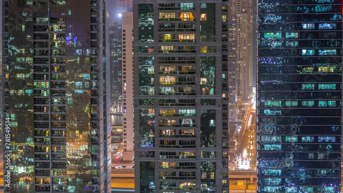 Residential and office buildings in Jumeirah lake towers district night timelapse in Dubai