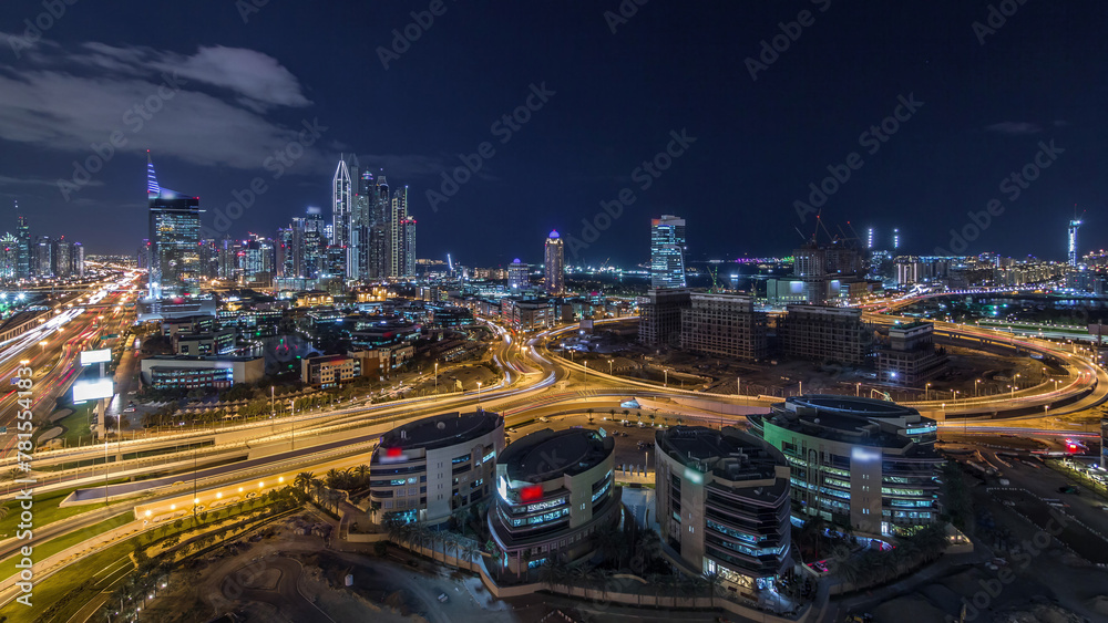 Dubai Media City with Modern buildings aerial night timelapse, United Arab Emirates