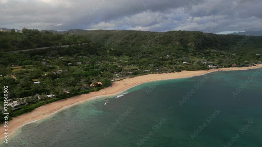 Aerial view of teal blue Pacific ocean with scenic high green mountains covered with rainforest on Oahu Island, Honolulu, Hawaii. High quality 4k footage Aerial view of teal blue Pacific ocean with scenic high green mountains covered with rainforest on Oahu Island, Honolulu, Hawaii. High quality 4k footage