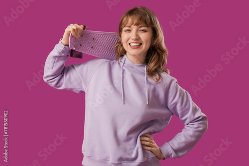 Young happy woman with skat...