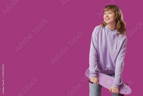 Young happy woman with skat...