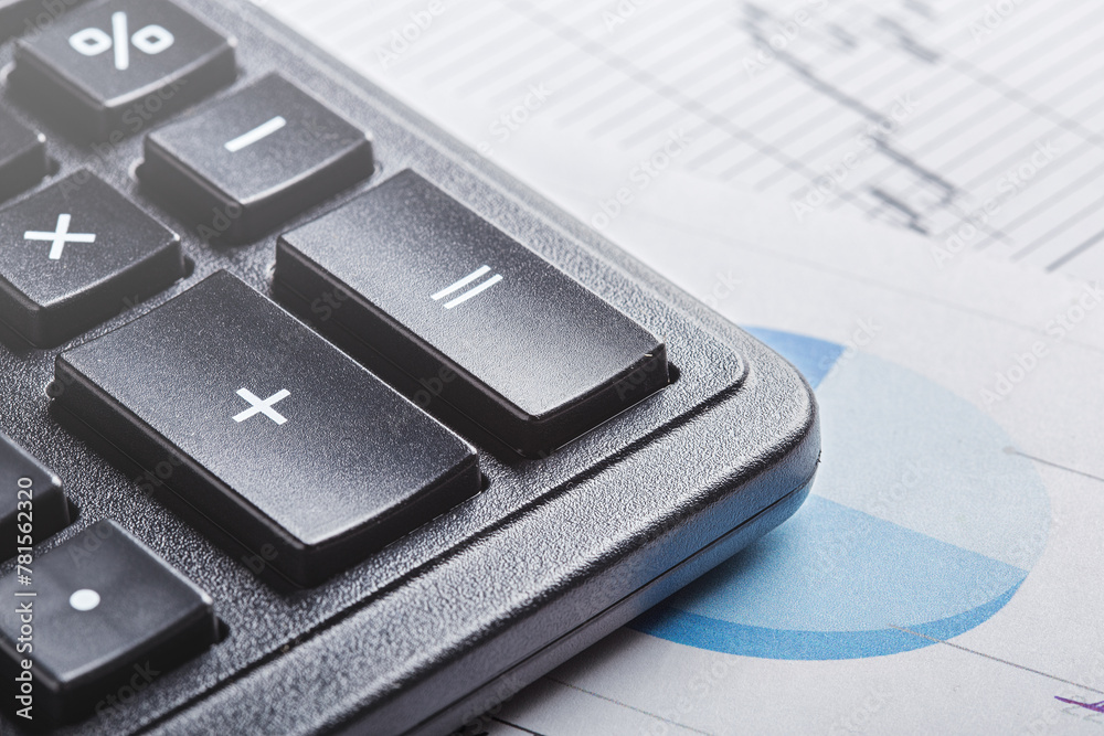 calculator and financial charts. Investment and capital accumulation concept calculator and financial charts. Investment and capital accumulation concept