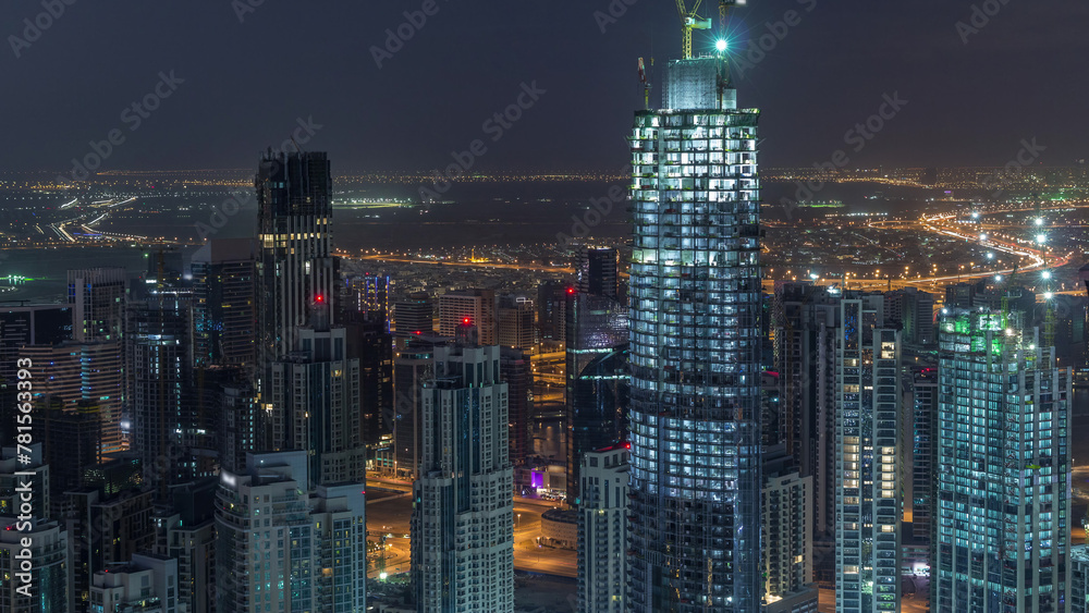 Amazing aerial view of Dubai downtown skyscrapers night to day timelapse, Dubai, United Arab Emirates