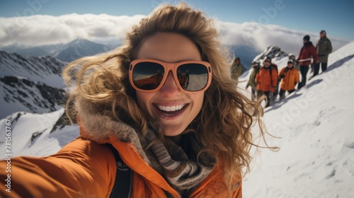Happy woman in the mountains with her friends photo