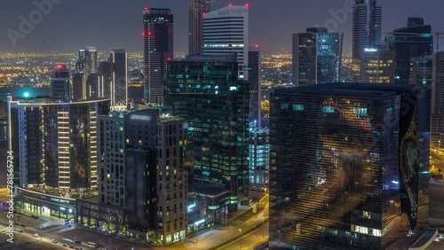 Panorama of Business bay Dubai night to day aerial timelapse.