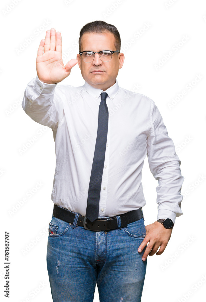 Middle age bussines arab man wearing glasses over isolated background doing stop sing with palm of the hand. Warning expression with negative and serious gesture on the face. Middle age bussines arab man wearing glasses over isolated background doing stop sing with palm of the hand. Warning expression with negative and serious gesture on the face.