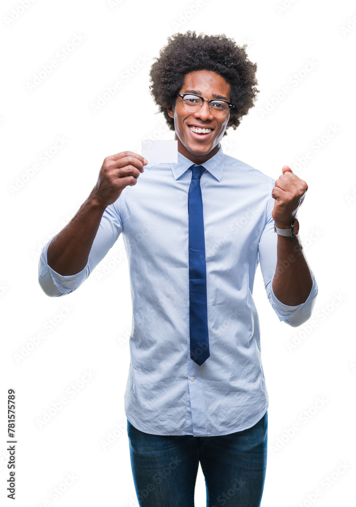 Afro american man holding visit card over isolated background screaming proud and celebrating victory and success very excited, cheering emotion Afro american man holding visit card over isolated background screaming proud and celebrating victory and success very excited, cheering emotion