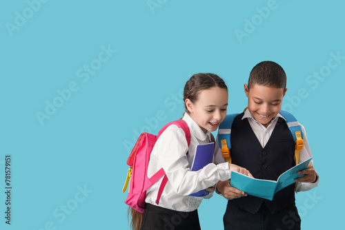 Happy diverse schoolchildre...