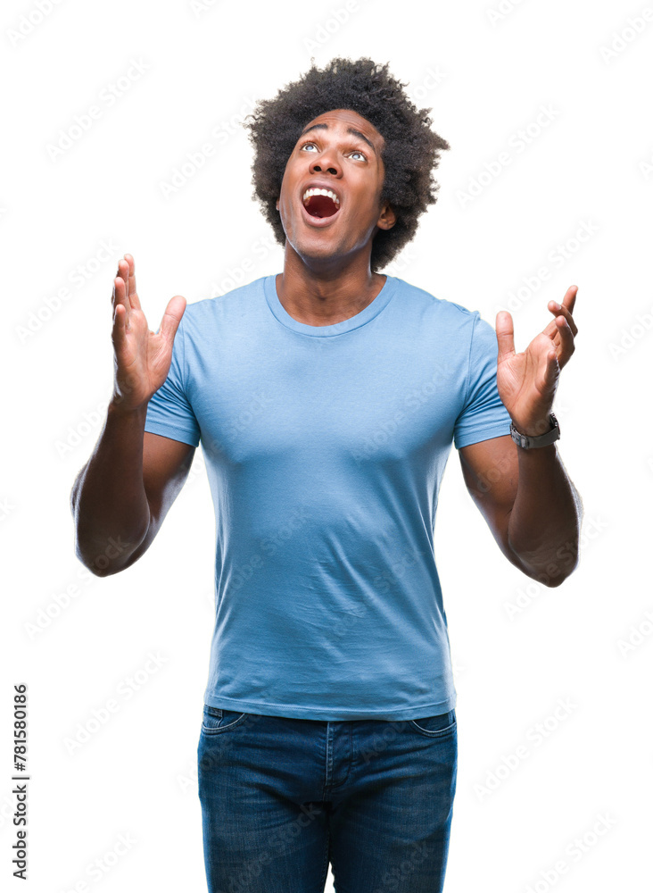Afro american man over isolated background crazy and mad shouting and yelling with aggressive expression and arms raised. Frustration concept. Afro american man over isolated background crazy and mad shouting and yelling with aggressive expression and arms raised. Frustration concept.