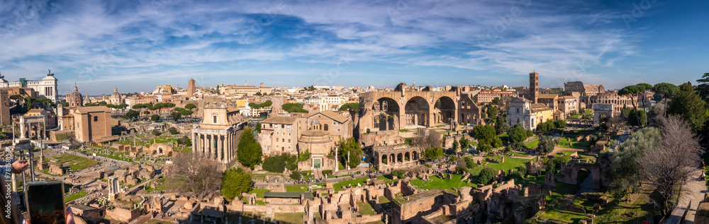 Aerial panoramic view from Palatine Hill. Roman Forum, Cityscape, sunny day ancient Rome, Arch of Severus, temple of Saturn, temple of Vesta, Basilica of Maxentius, Arch of Titus and. Italy.