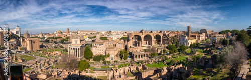 Aerial panoramic view from Palatine Hill. Roman Forum, Cityscape, sunny day ancient Rome, Arch of Severus, temple of Saturn, temple of Vesta, Basilica of Maxentius, Arch of Titus and. Italy. photo