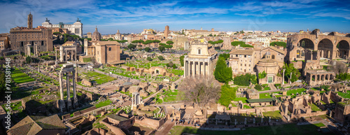 Aerial panoramic view from Palatine Hill. Roman Forum, Cityscape, sunny day ancient Rome, Arch of Severus, temple of Saturn, temple of Vesta, Basilica of Maxentius, Arch of Titus and. Italy. photo