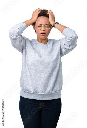 Young beautiful african american woman wearing glasses over isolated background suffering from headache desperate and stressed because pain and migraine. Hands on head.