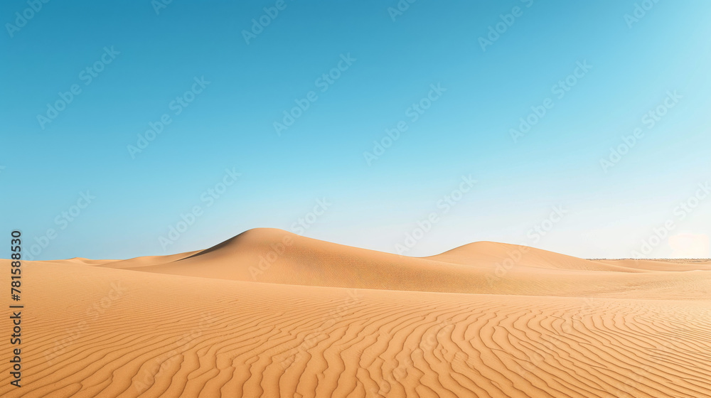 An expansive desert landscape stretches beneath a clear blue sky, evoking feelings of solitude, vastness, and the beauty of nature's simplicity