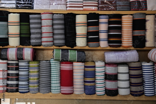 an exhibition selling cotton strips in a shop on the square in Ouagadougou Burkina Faso West Africa