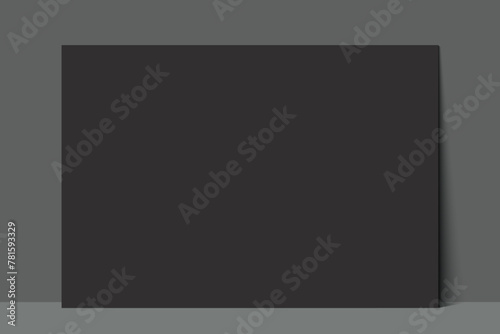 Blank black paper leaning against a grey wall background. Poster gallery vector mockup for horizontal art, image, or text placement.