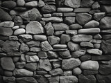 Black and white stone wall serves as a stylish backdrop