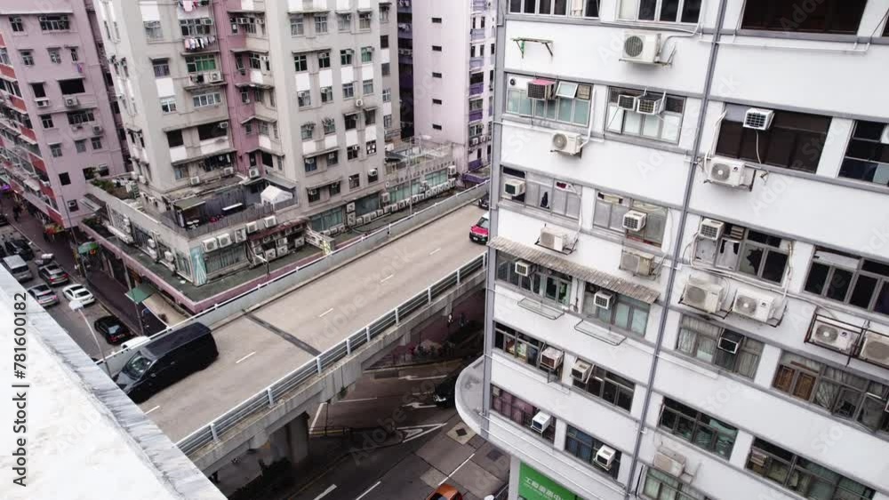 A multi level road in Hong Kong in the middle of skyscrapers