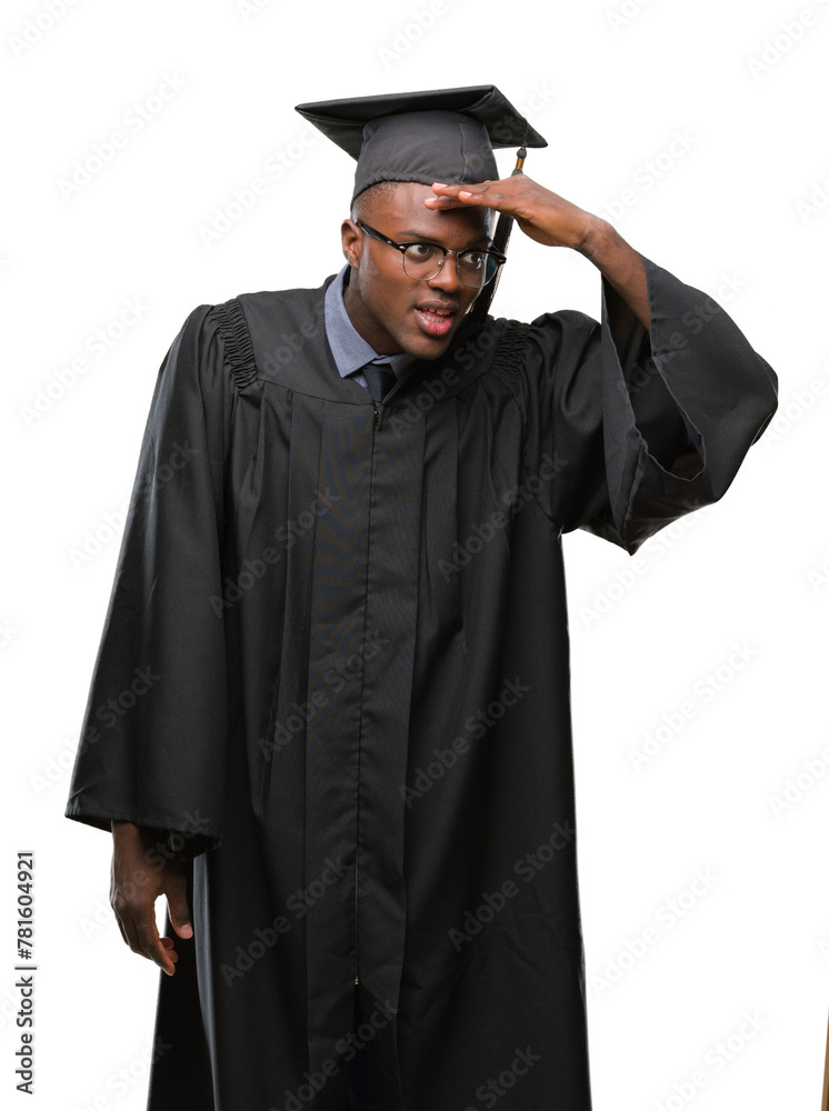 Young graduated african american man over isolated background very happy and smiling looking far away with hand over head. Searching concept. Young graduated african american man over isolated background very happy and smiling looking far away with hand over head. Searching concept.